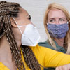Two people in masks for Bachelor of Science in Public Health Online Degree Completion Program
